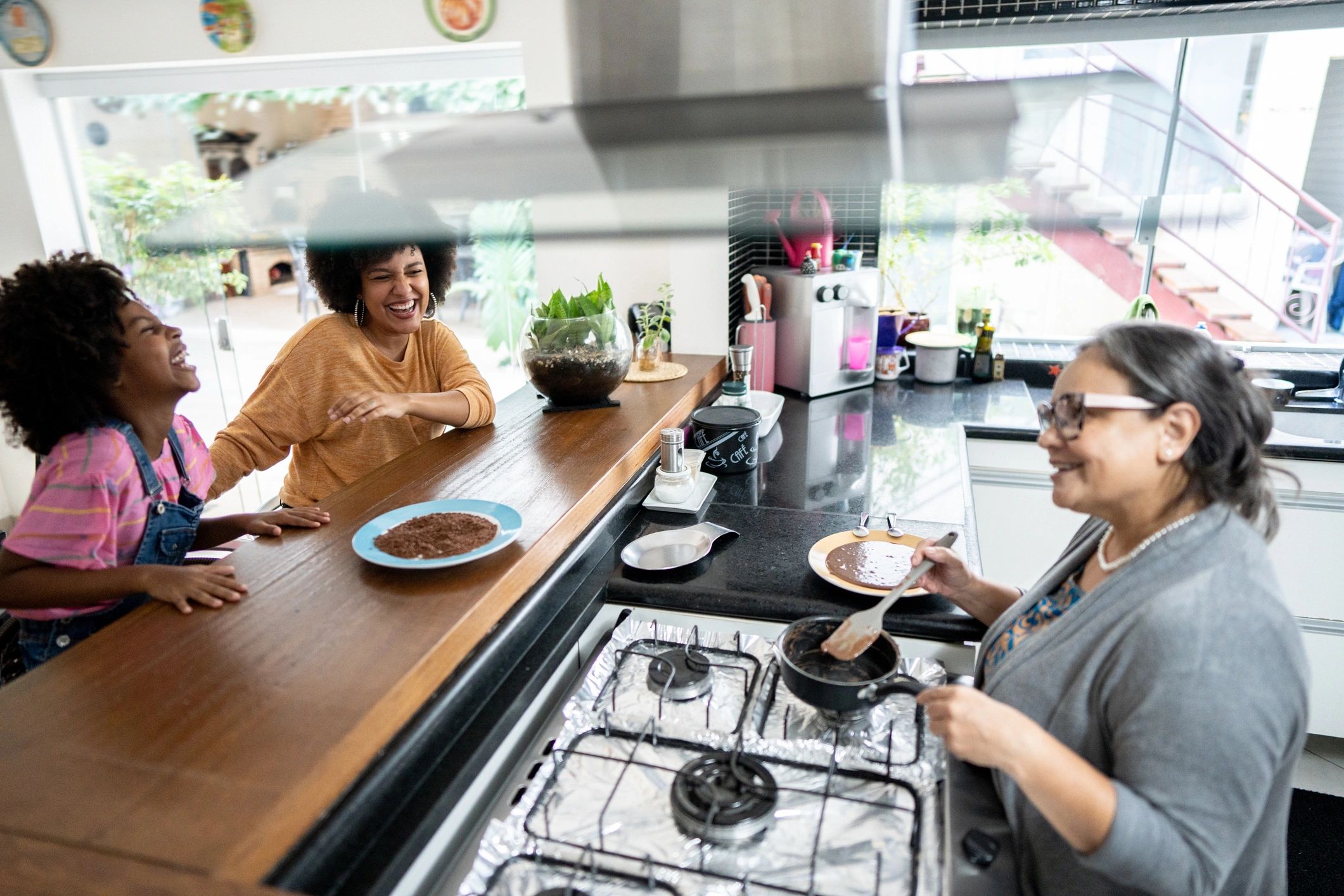 Family cooking together in a home kitchen