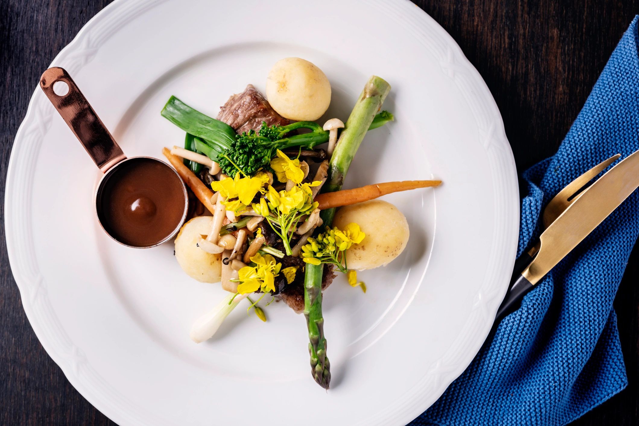 Plated main dish with seasonal vegetables