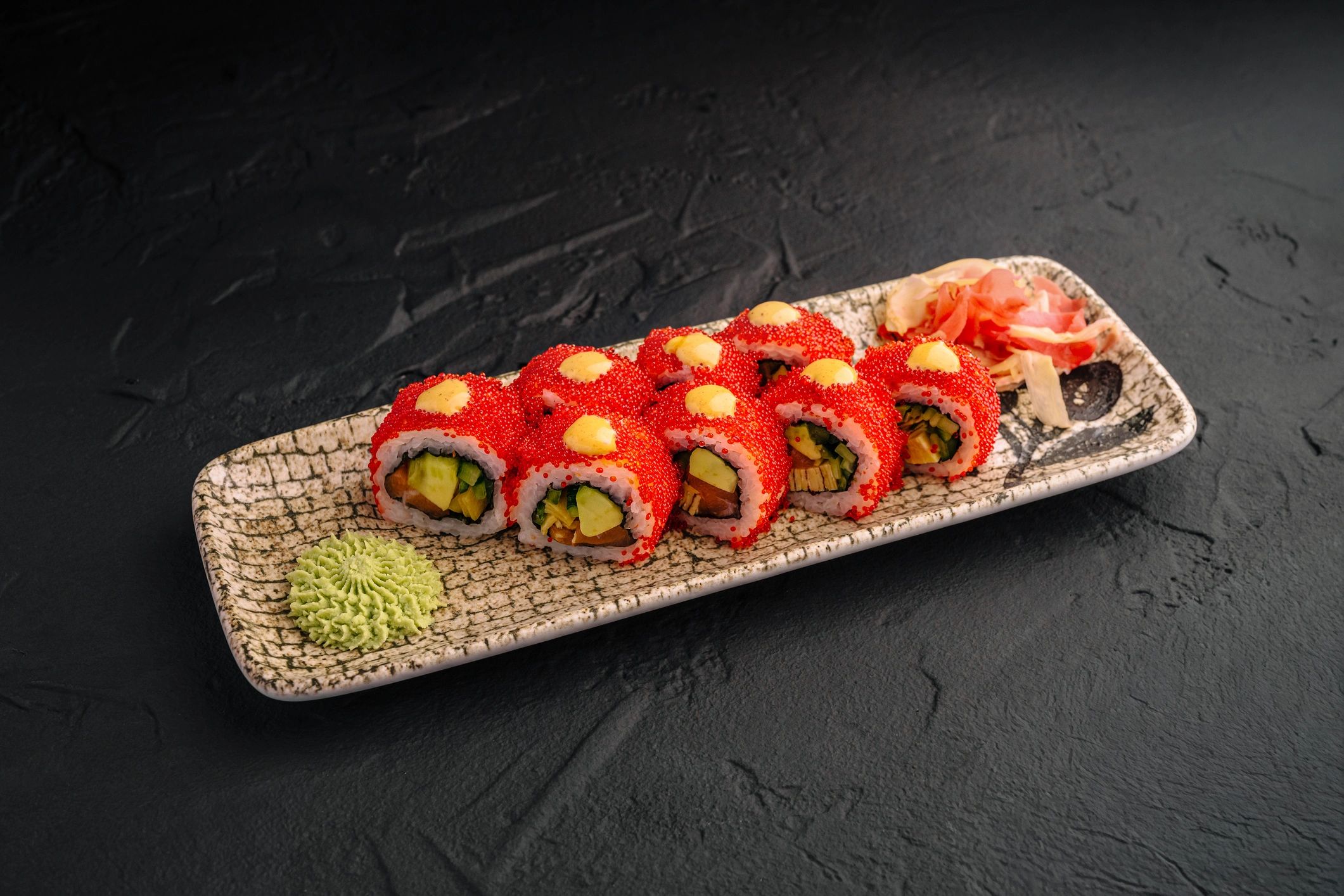 Fresh sushi rolls on a decorative plate